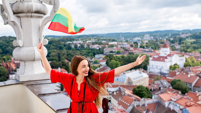 Happy female tourist in Vilnius