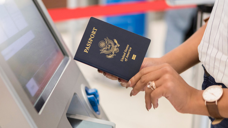 Woman holding American passport