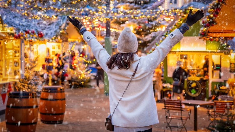 back of woman at outdoor market