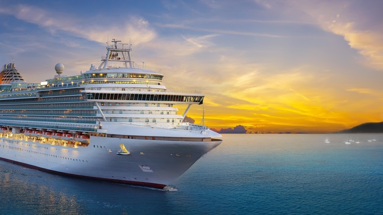 Cruise ship sailing as the sun sets